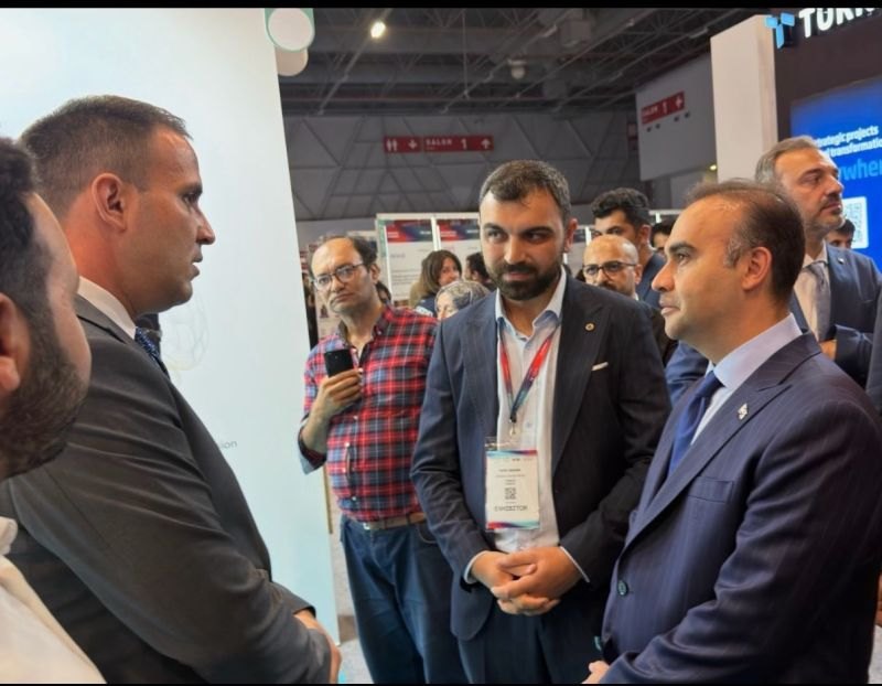 Guests visiting the Opinion AI stand at GITEX AI Türkiye in Istanbul